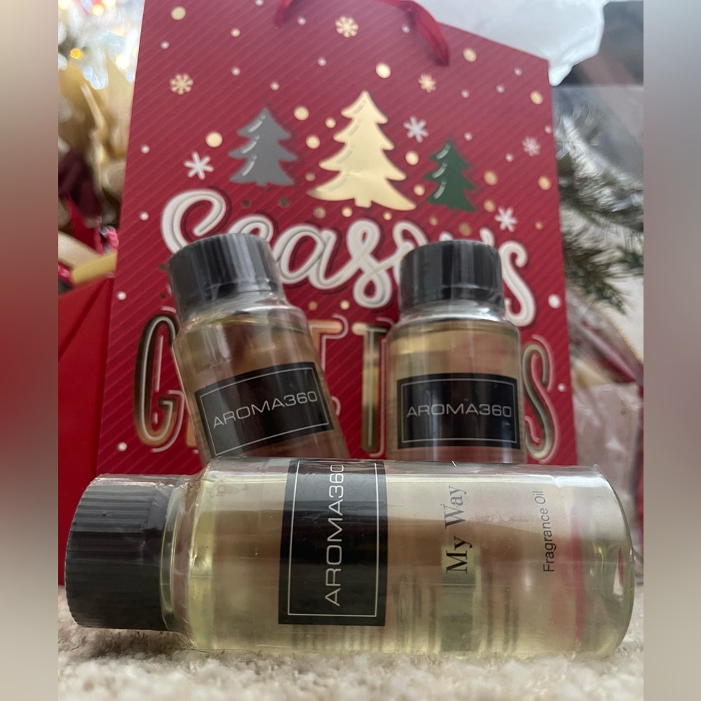 Sealed brand new set of 3 bottles. Scent: My way 
AROMA360 fragrance oil.